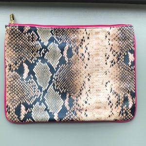 Estée Lauder snake print clutch